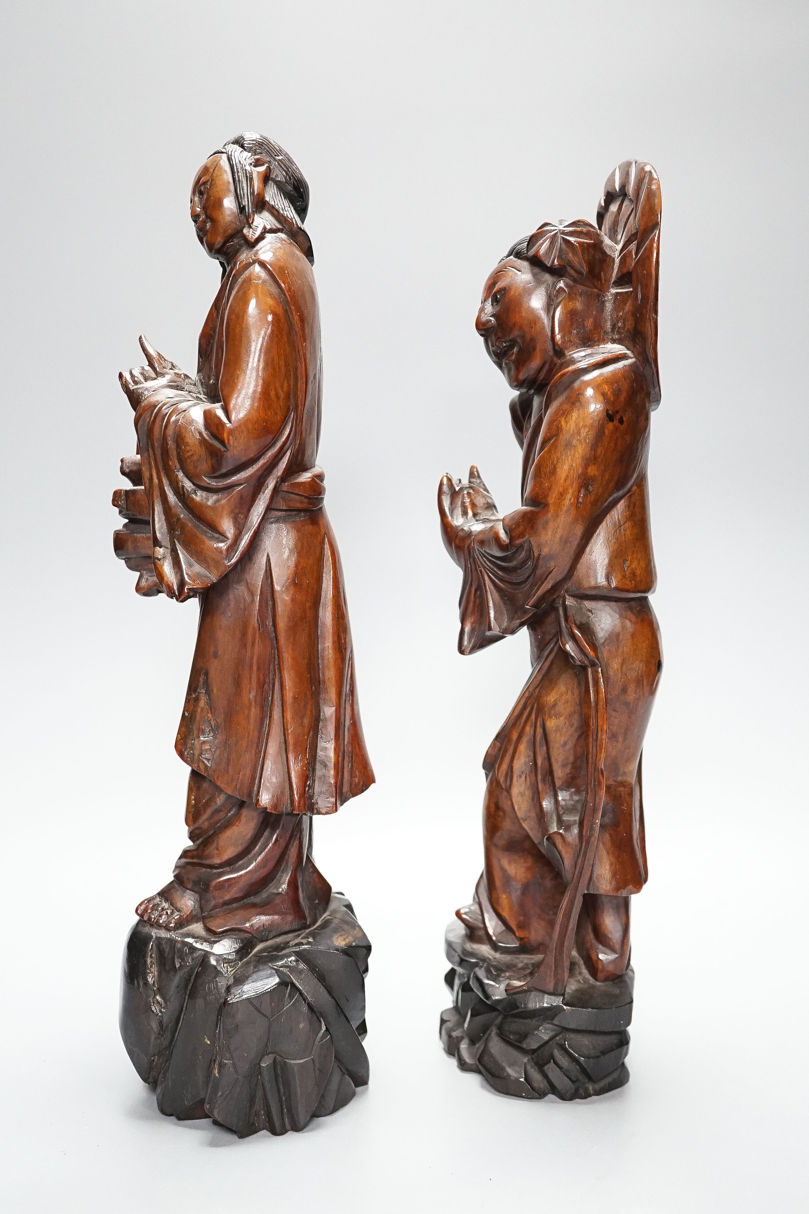 Two early 20th century Chinese carved hardwood figures of ladies 39cm